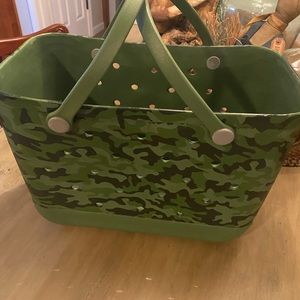 X large rubber tote.  Great for beach, or packing toiletries for vacation.